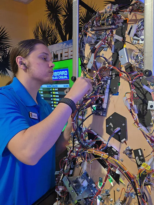 Custom LED display and arcade game installation for resort client